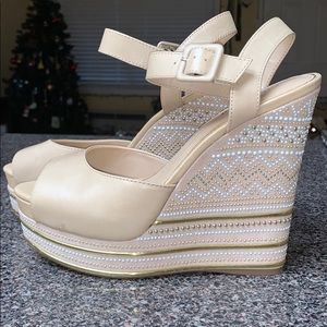 Gianni Bini Tan wedges with embellishment on heel.